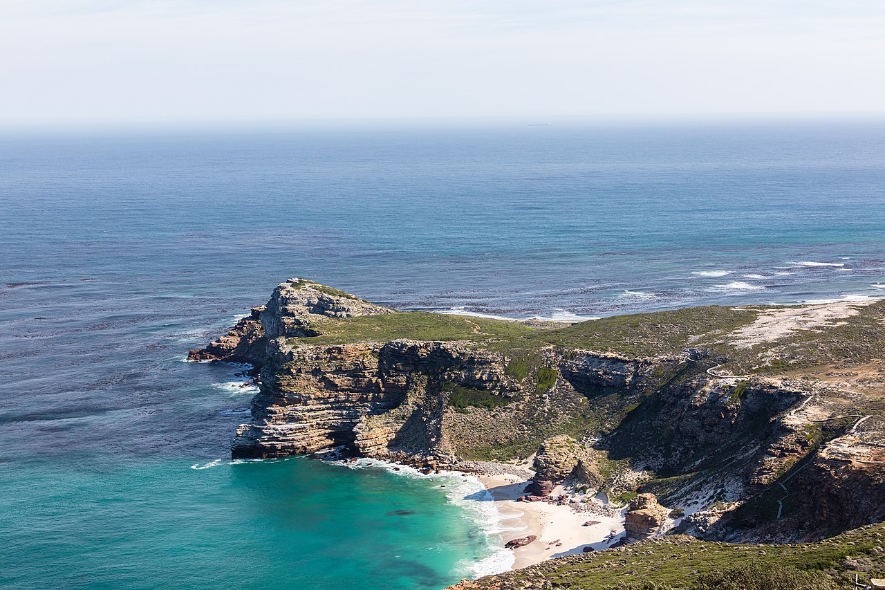 The Cape of Good Hope viewed westward from the coastal cliffs above Cape Point overlooking Dias Beach in South Africa.
