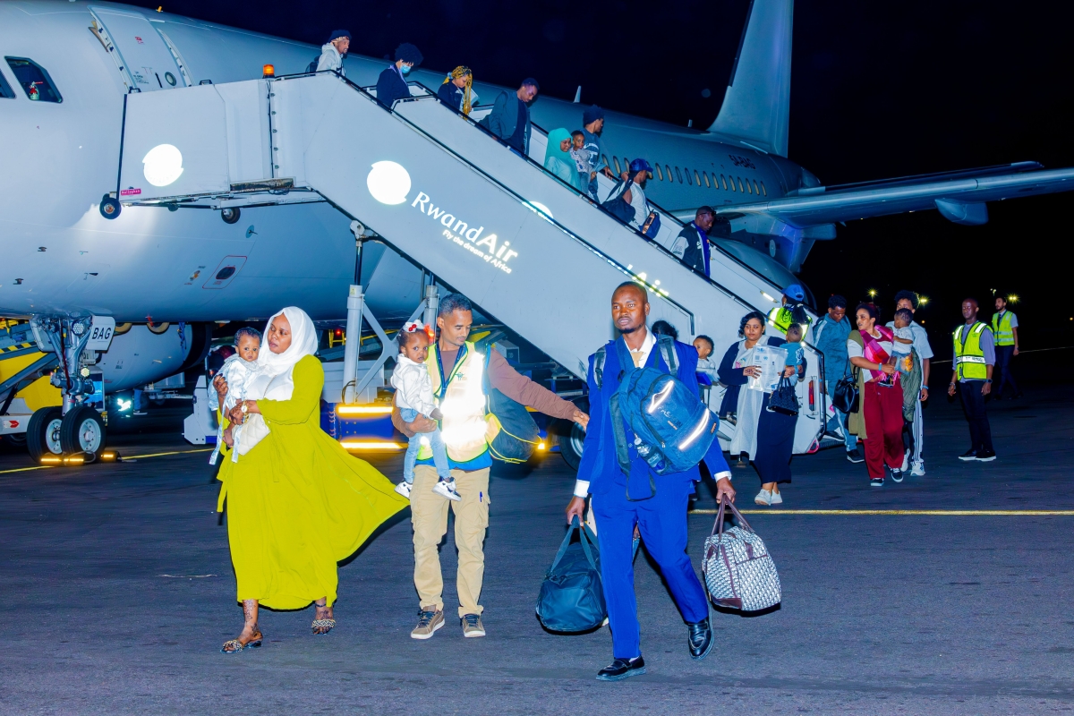 Asylum seekers evacuated from Libya disembark upon arrival at Kigali International Airport in Rwanda on Wednesday, June 17, 2026, before being transferred to a temporary transit facility under the UNHCR-supported Emergency Transit Mechanism.