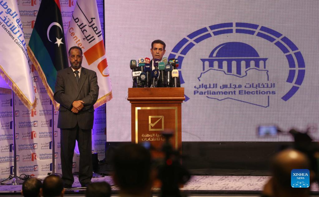 Imad Al-Sayah (R, Rear), the head of Libya's High National Elections Commission (HNEC), speaks during a press conference in Tripoli, Libya, on Oct. 24, 2021. Libya's High National Elections Commission on Sunday announced a plan for the upcoming presidential and parliamentary elections. (Photo by Hamza Turkia/Xinhua)