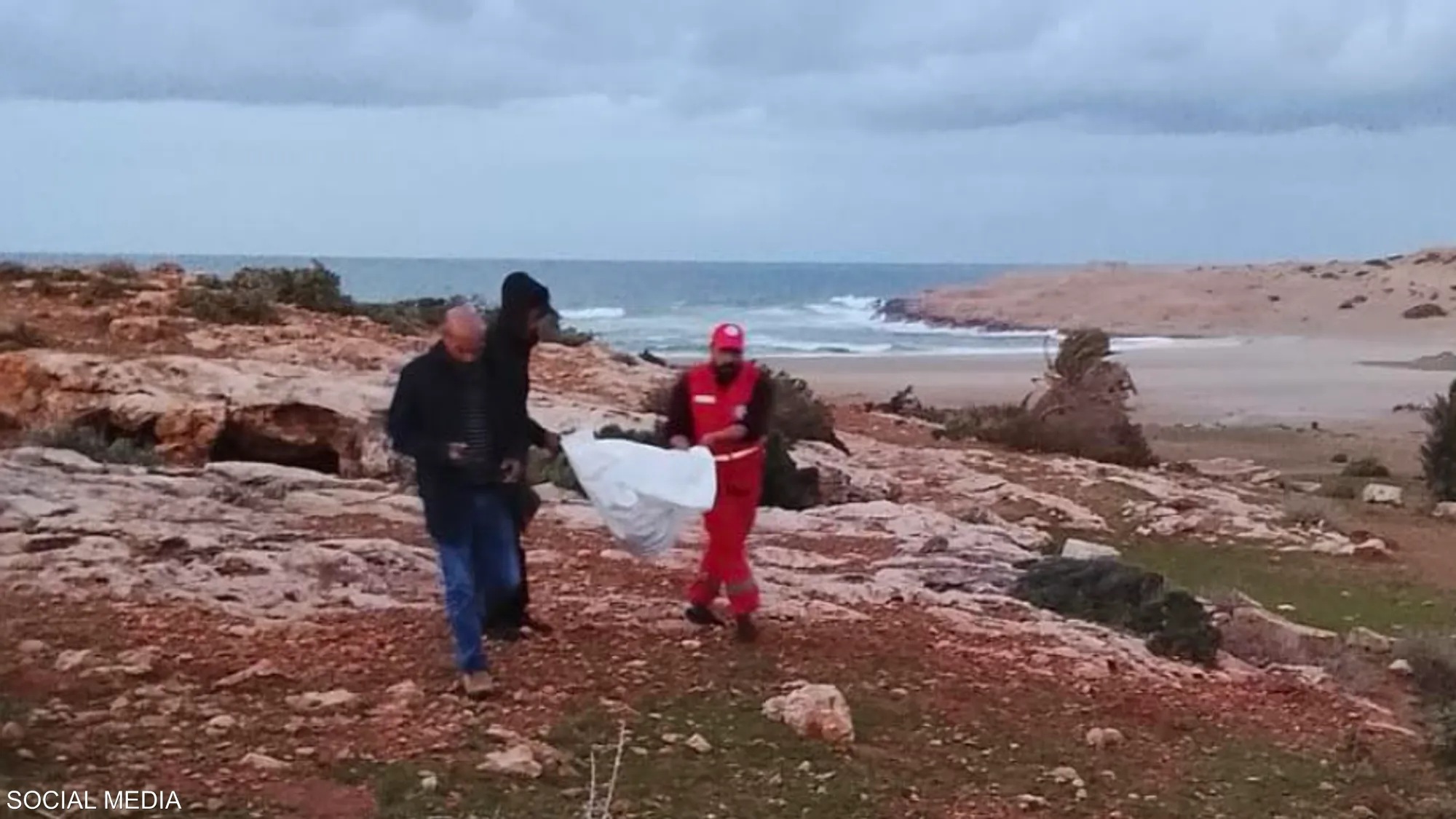 Rescue teams from the Libyan Red Crescent recover remains from the Mediterranean Sea (file photo).