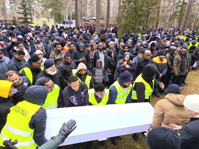 Somali mourners gather in Vantaa, Finland on March 19 for the funeral of a family of five killed in a March 3 apartment fire, paying their final respects.