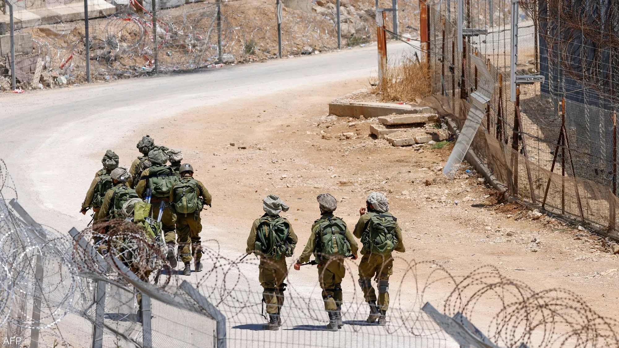 Israeli forces seen walking through southern Syria's Quneitra countryside during reported incursions and heightened military activity in the border area.