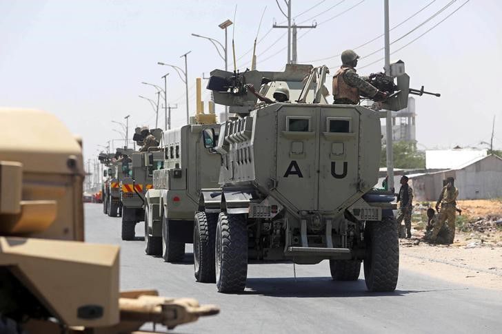 African Union Mission in Somalia (AMISOM) peacekeepers travel on armoured vehicle as they leave the Jaale Siad Military academy after being replaced by the Somali military in Mogadishu, Somalia. February 28, 2019. REUTERS/Feisal Omar