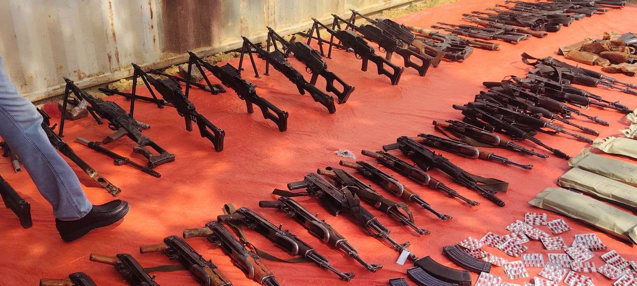 Weapons, ammunition and narcotic pills seized by Sudanese security forces are displayed in White Nile State on August 23, 2026.
