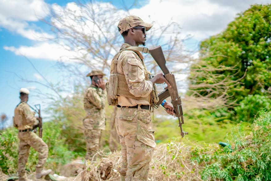 Well-trained Somali National Army soldiers remain on alert during a security operation.