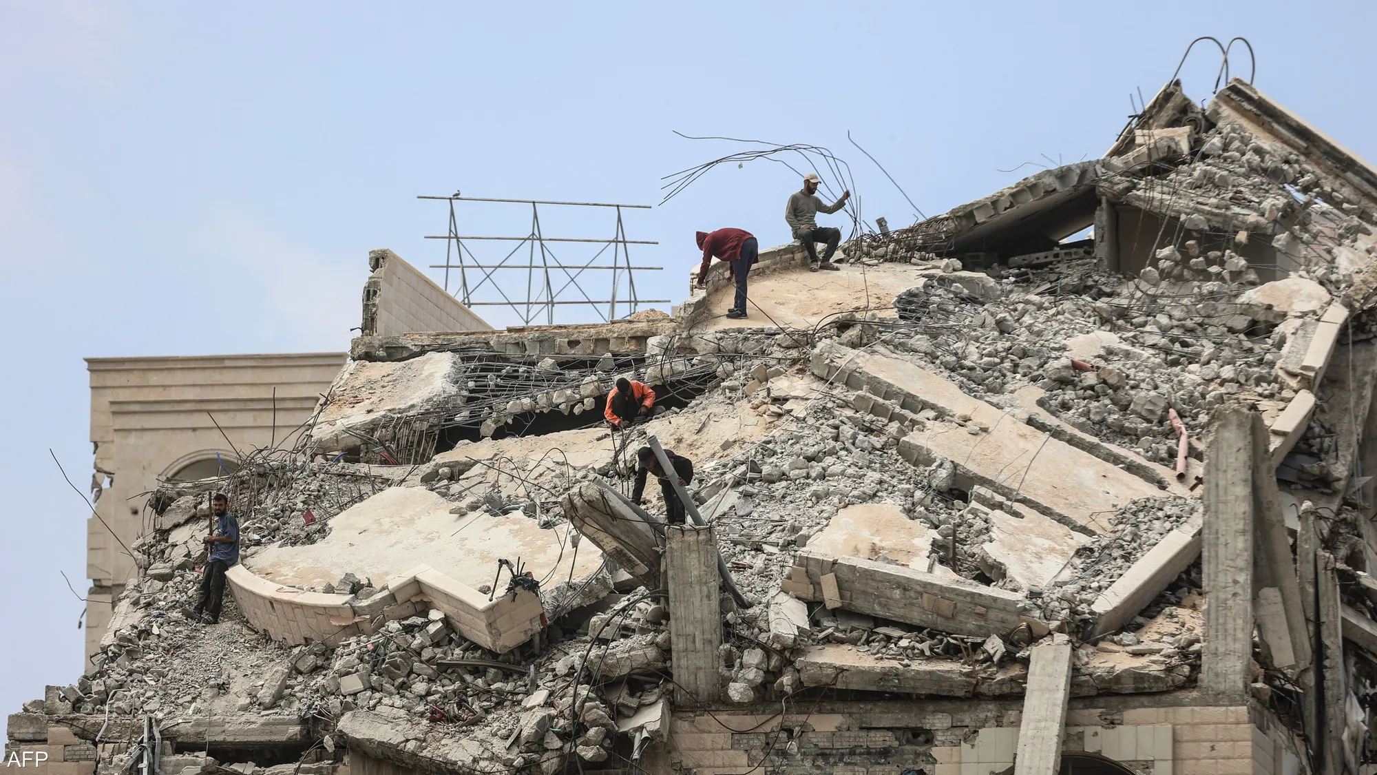 Heavily damaged residential buildings lie in ruins after Israeli airstrikes in the Gaza Strip.