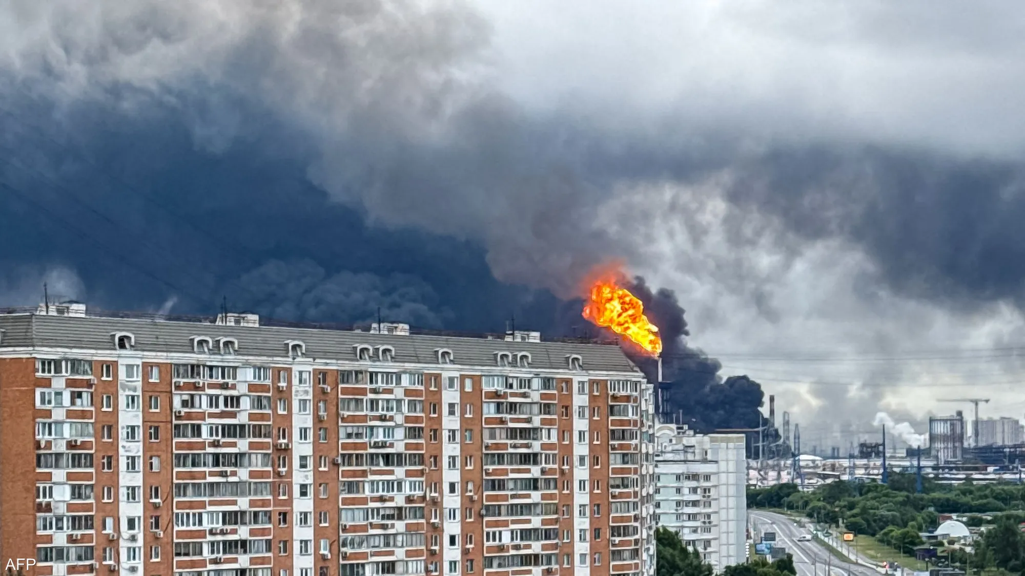 Smoke rises over the Moscow skyline following reported Ukrainian drone strikes, with thick plumes spreading across the city amid heightened tensions and active air defenses.