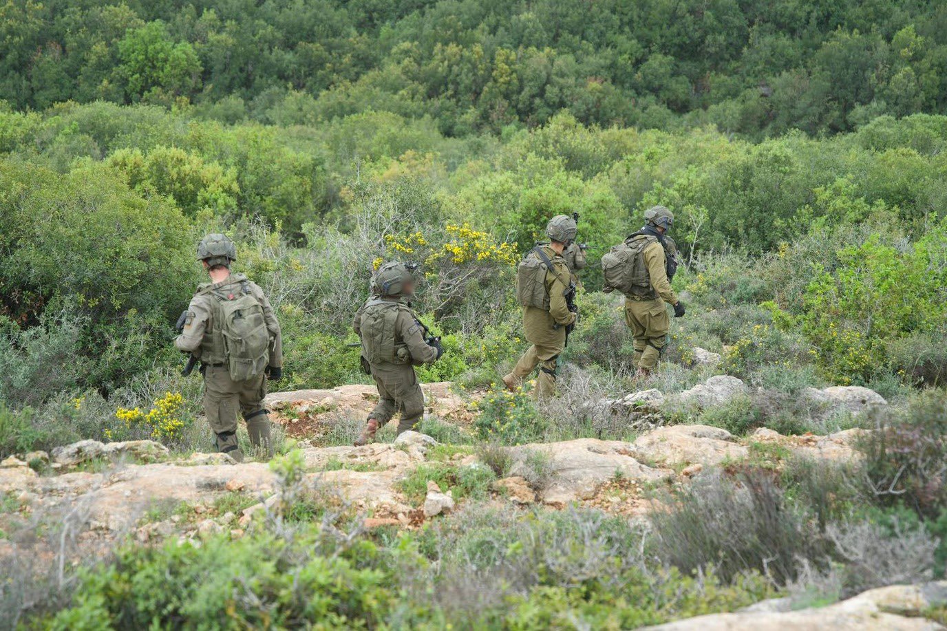 Troops from Israel Defense Forces are positioned near the Lebanon border amid heightened alert levels following renewed clashes, drone interceptions, and evacuation warnings issued to multiple southern villages.