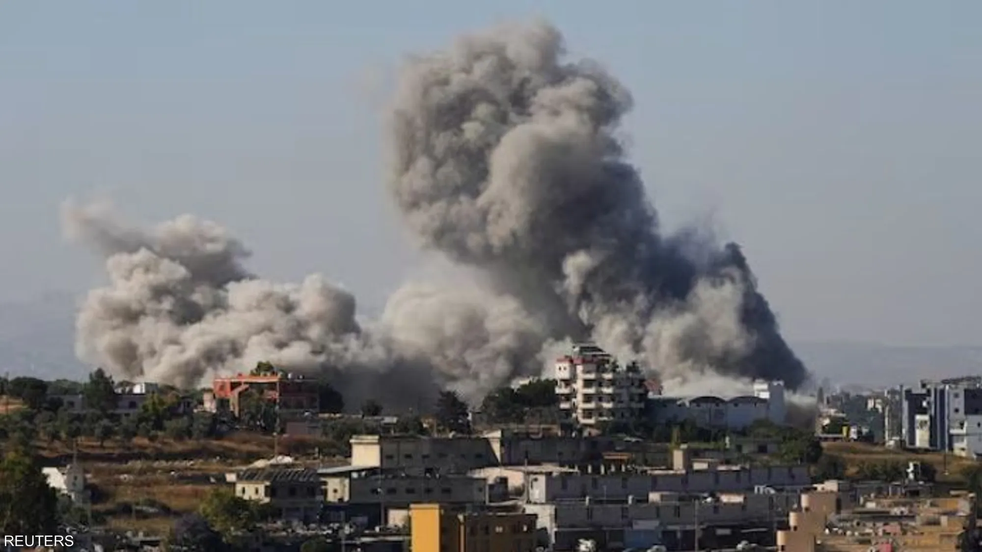 Smoke rises from southern Lebanon following an Israeli airstrike; emergency crews moved into the area shortly after impact to assess damage and begin response operations.