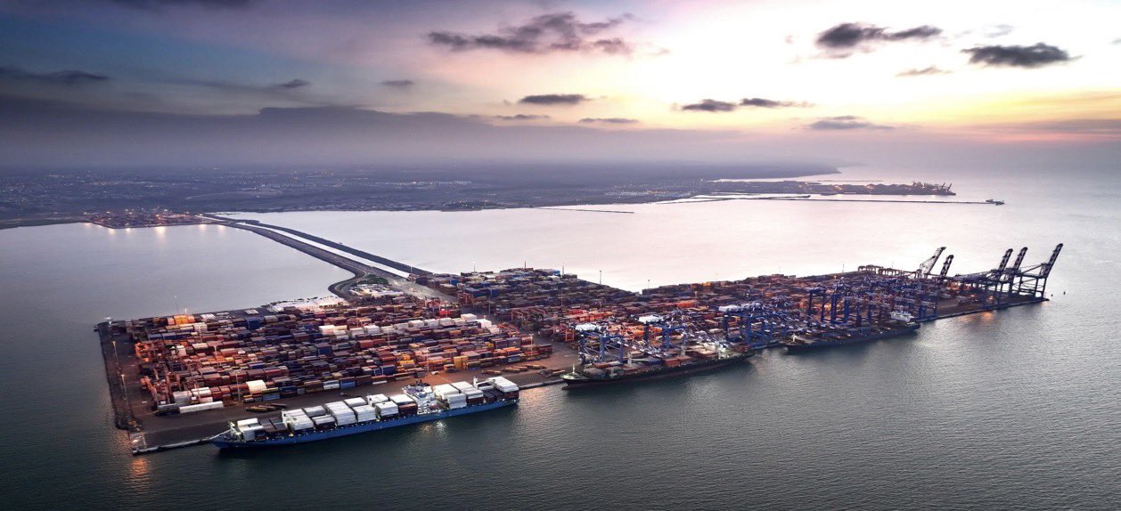 Aerial view of Djibouti's port facilities, where container terminals and cargo cranes operate continuously, reflecting the country's growing role as a key maritime logistics hub on the Red Sea corridor.
