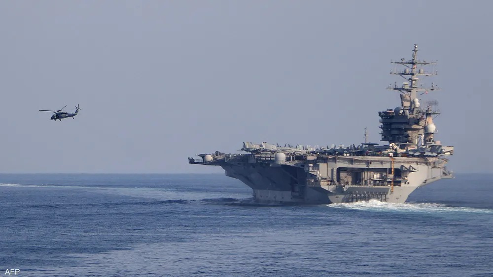 U.S. Navy warships sail in formation during deployment to the Middle East, as Washington expands maritime enforcement operations in the Strait of Hormuz amid rising regional tensions.