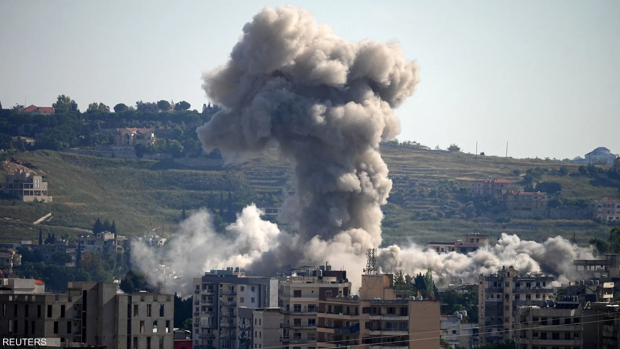 Flames and smoke rise following reported Israeli airstrikes in southern Lebanon amid escalating cross-border tensions.