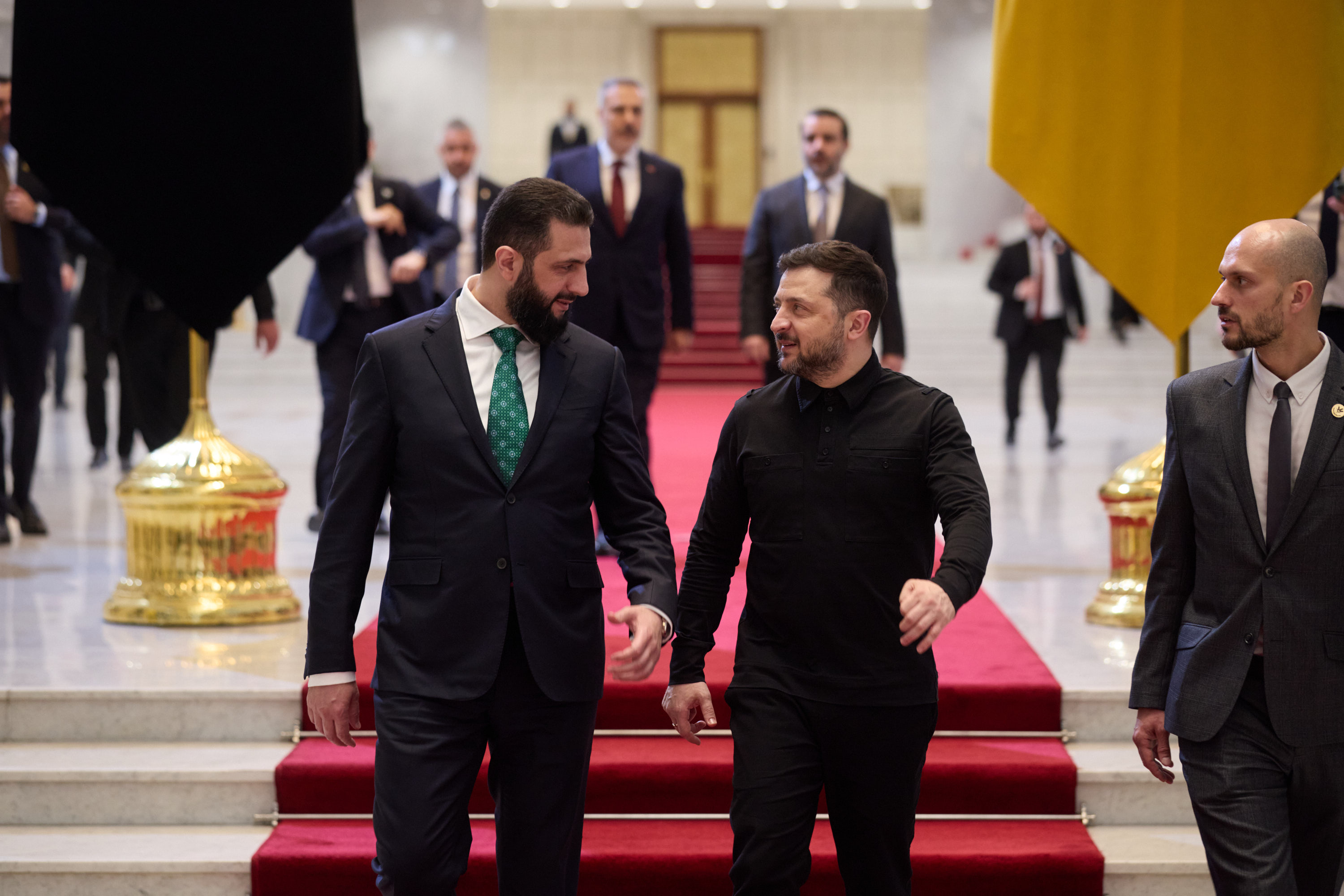 Ukrainian President Volodymyr Zelensky meets Syrian leader Ahmed al-Sharaa in Damascus to discuss security cooperation and regional food supply partnerships.