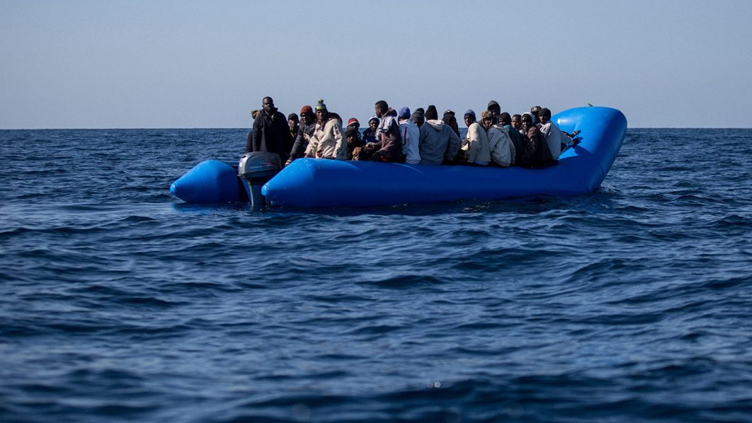 Inflatable boat carrying migrants intercepted off Libya's Tobruk coast during a maritime patrol operation.