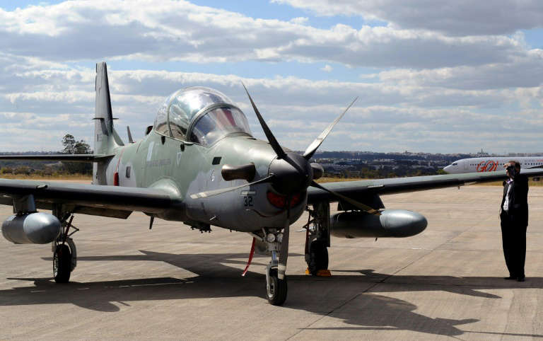 &copy; EVARISTO SA A Super Tucano aircraft on display during a defense fair at Brasilia's Air Base in 2012
