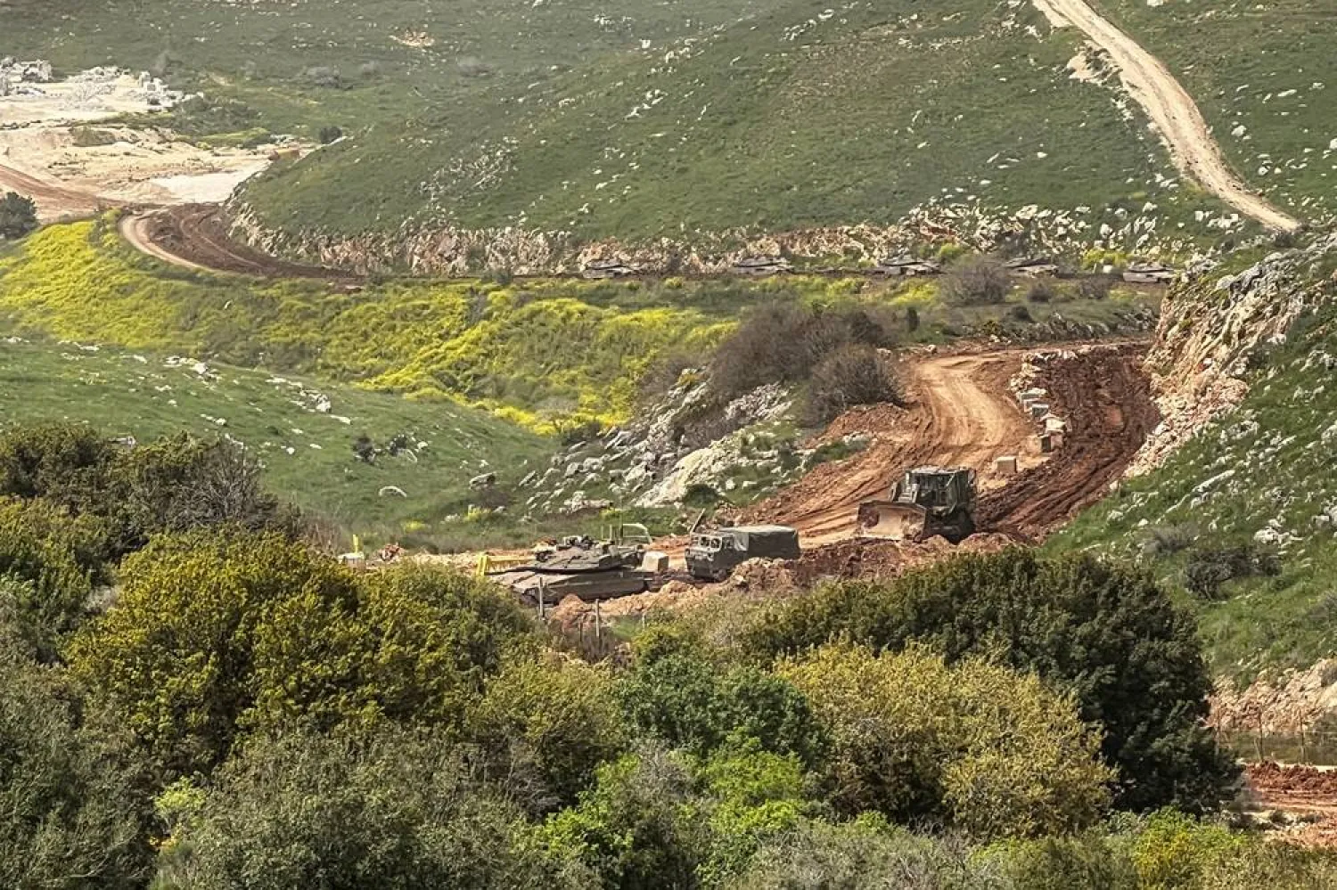 Israeli forces advance near southern Lebanon, carrying out coordinated air and ground operations against Hezbollah positions.