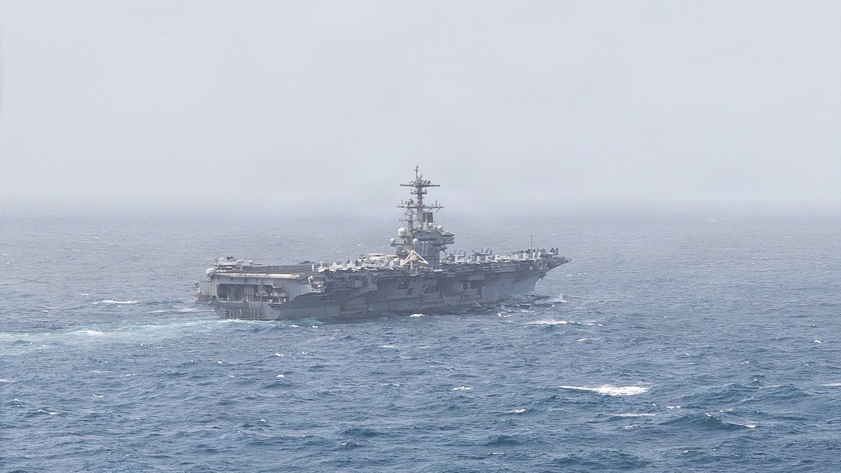 USS George H.W. Bush (CVN 77) sails in the Arabian Sea. Two aircraft carriers continue to operate in the Middle East as U.S. forces remain present and vigilant.