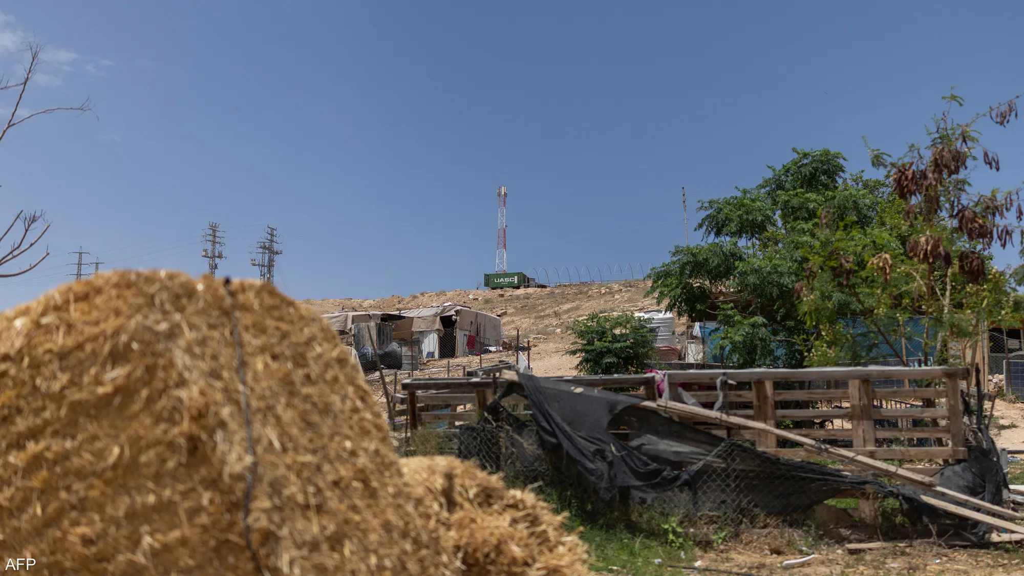 Khan al-Ahmar, an unrecognized Bedouin village east of Jerusalem in the occupied West Bank's E1 corridor, where residents face ongoing legal and political uncertainty amid proposed demolition and displacement plans.