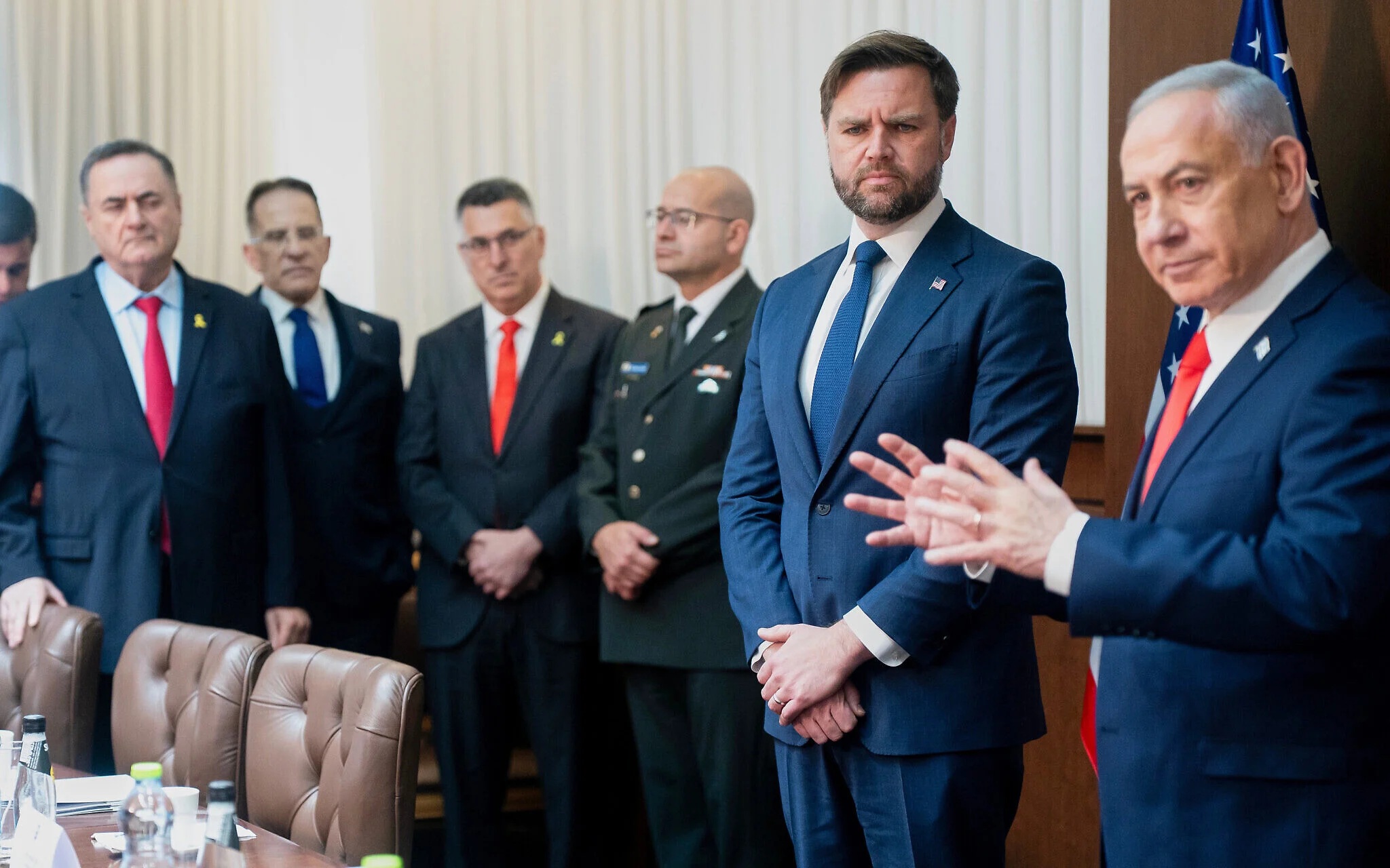 US Vice President JD Vance, second right, listens as Prime Minister Benjamin Netanyahu speaks during a meeting at the Prime Minister's Office in Jerusalem, on Oct. 22, 2025. (Nathan Howard/The New York Times via AP, Pool)