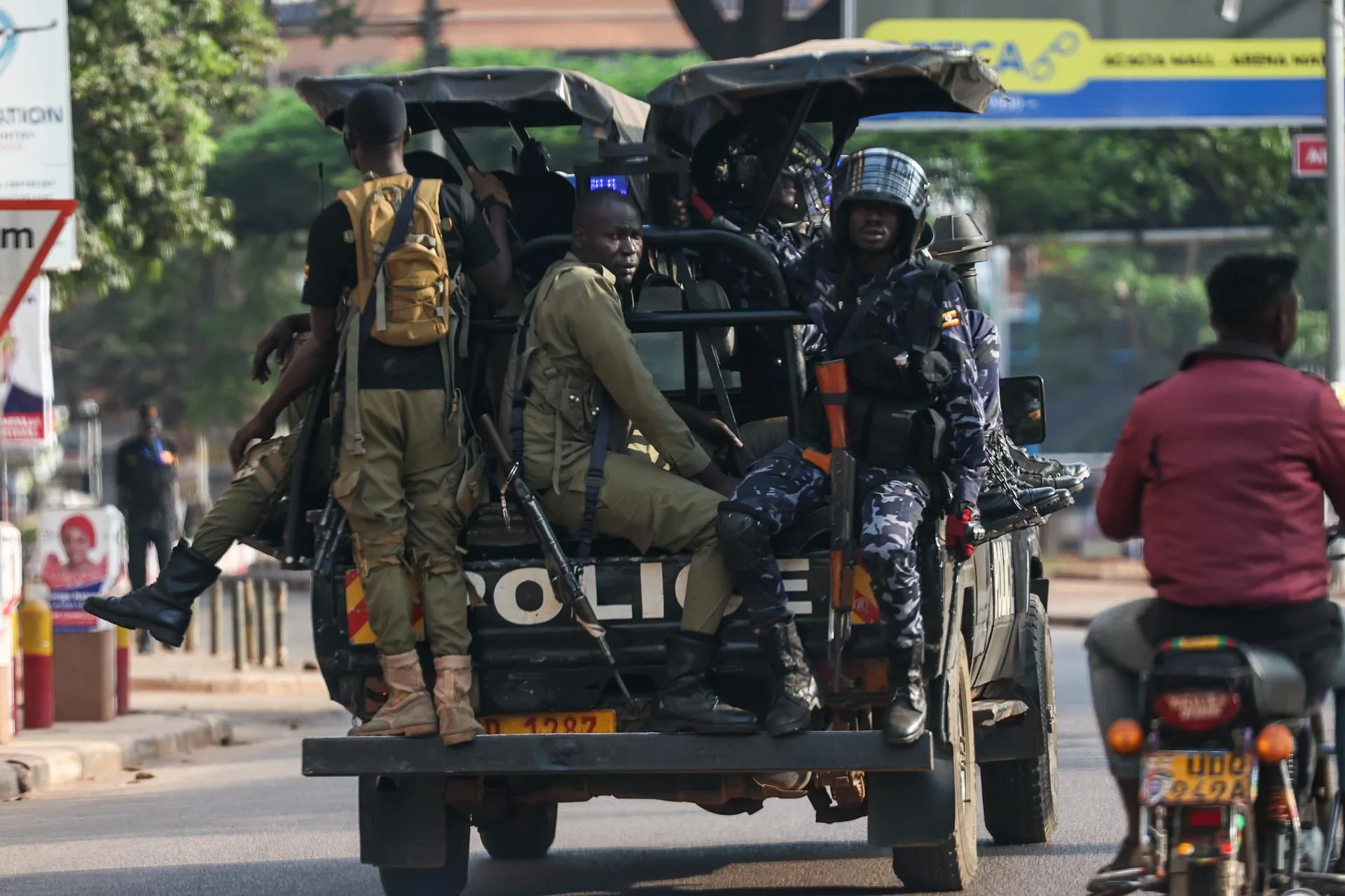 Ugandan police officers in operation securing an urban area in Kampala.
