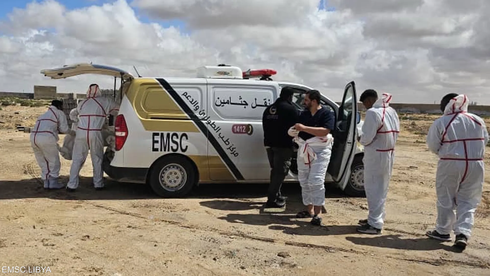Rescue workers from the Emergency Medicine and Support Center transport bodies recovered from the coast near Zuwara, following recent migrant tragedies along Libya's western shoreline.
