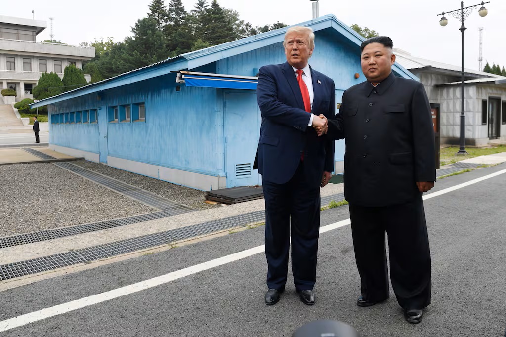 U.S. President Donald Trump, left, meets with North Korean leader Kim Jong Un at the border village of Panmunjom in the Demilitarized Zone on June 30, 2019. (Susan Walsh/AP)