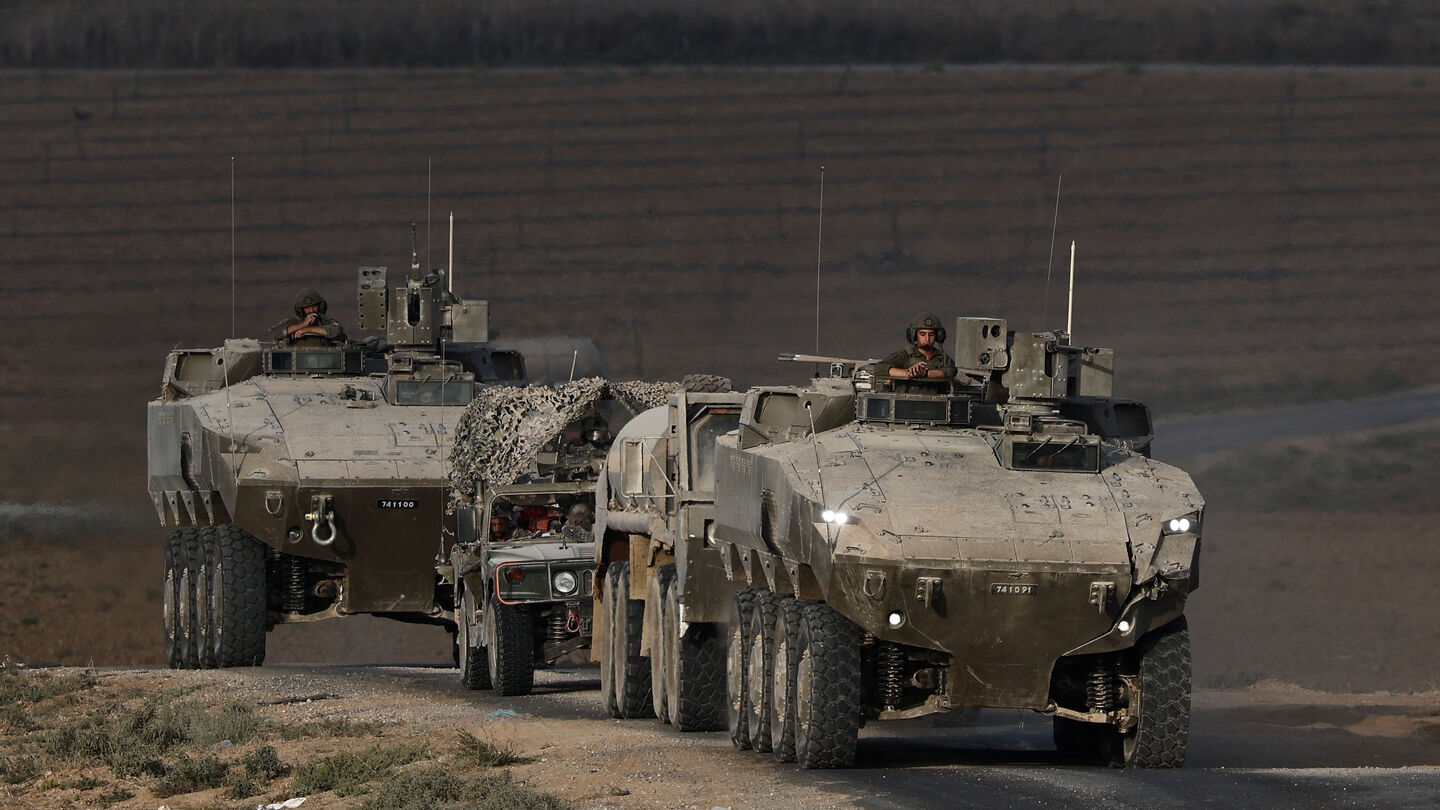 An Israeli military convoy manoeuvres on Israeli side of the Israel-Gaza border, in Israel, September 21, 2025. REUTERS/Amir Cohen/File Photo — Amir Cohen