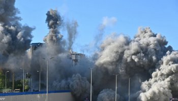 Thick black smoke rises over southern Beirut as Israeli airstrikes hit residential areas on April 3, 2026.