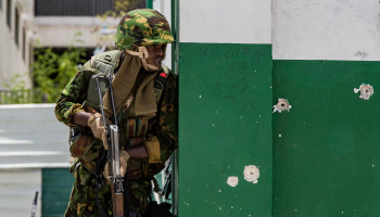 Kenyan police member of the Multinational Security Support Mission (MMAS) standing guard after an attack on Haitian Prime Minister Garry Conille in Port-au-Prince, Haiti. Jun. 29, 2024. EFE/ Mentor David Lorens.