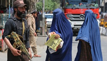 Code says a woman who goes to her parents' home without her husband's permission – even to escape violence – faces prison Credit: Shafiullah Kakar/Getty Images