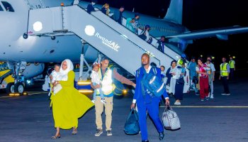 Asylum seekers evacuated from Libya disembark upon arrival at Kigali International Airport in Rwanda on Wednesday, June 17, 2026, before being transferred to a temporary transit facility under the UNHCR-supported Emergency Transit Mechanism.