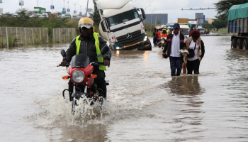 Floodwaters submerge roads and homes in Kenya after heavy rains, displacing thousands and disrupting transport across multiple counties.