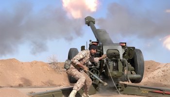 Iranian soldier managing missile launch toward Israel in response to US–Israeli strikes.