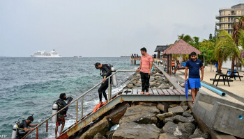 Rescue teams in the Maldives search for the bodies of four missing Italian divers in a deep cave diving operation.