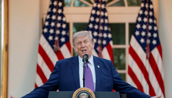 US President Donald Trump gestures while delivering remarks at the White House in Washington, May 11, 2026.