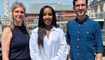 Sarah M. Khalif, center, newly appointed Leuven Alderman for Care, Welfare and Cemeteries, pictured among colleagues during the announcement.