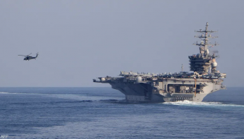 U.S. Navy warships sail in formation during deployment to the Middle East, as Washington expands maritime enforcement operations in the Strait of Hormuz amid rising regional tensions.