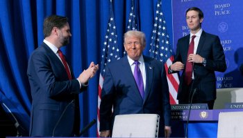US Vice President JD Vance (L) and Jared Kushner (R) watch as US President Donald Trump arrives for the inaugural meeting of the Board of Peace at the Institute of Peace on February 19, 2026 in Washington, DC. (Chip Somodevilla/Getty Images/AFP)