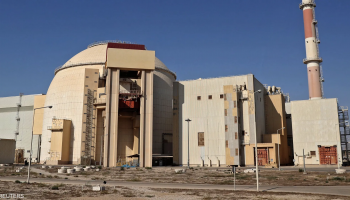 Russian technicians operate at Iran's Bushehr nuclear power plant as Rosatom reduces its on-site workforce following a phased evacuation amid regional tensions.