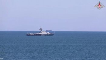 Russian naval vessel in the Caspian Sea during maritime exercises.