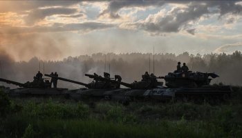 Russian forces move through the Kharkiv region in northeastern Ukraine during ongoing military operations near contested frontline areas, as fighting and aerial attacks continue across the region.
