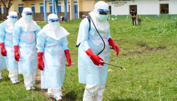 Health workers arrive at a treatment center to conduct disinfection drills in Rwampara, Democratic Republic of the Congo, May 21, 2026. / CFP