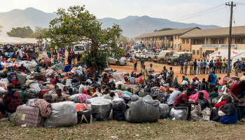 Displaced Malawian families shelter at a makeshift camp in Durban after anti-immigration protests and threats prompted thousands of foreign nationals to seek repatriation from South Africa.