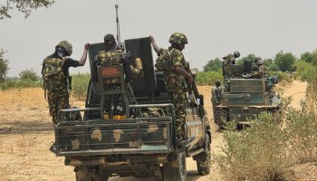Nigerian troops patrol a rural area during a security operation in northern Nigeria amid ongoing efforts to combat armed group activity and protect vulnerable communities.