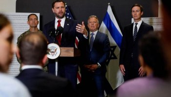 US Vice President JD Vance speaks to members of the media next to US Special Envoy to the Middle East Steve Witkoff and Jared Kushner in Kiryat Gat, Israel, October 21, 2025.