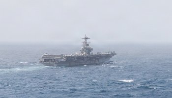 USS George H.W. Bush (CVN 77) sails in the Arabian Sea. Two aircraft carriers continue to operate in the Middle East as U.S. forces remain present and vigilant.