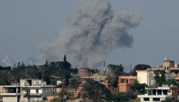 Smoke rises from buildings destroyed in reported Israeli airstrikes in southern Lebanon.