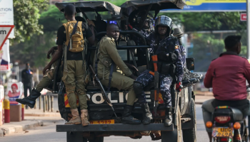 Ugandan police officers in operation securing an urban area in Kampala.