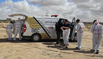 Rescue workers from the Emergency Medicine and Support Center transport bodies recovered from the coast near Zuwara, following recent migrant tragedies along Libya's western shoreline.