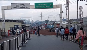 Health workers screen travelers at Rwanda–DR Congo border crossings in Rubavu district, where authorities have intensified Ebola surveillance and temperature checks following confirmed cases in neighboring regions.